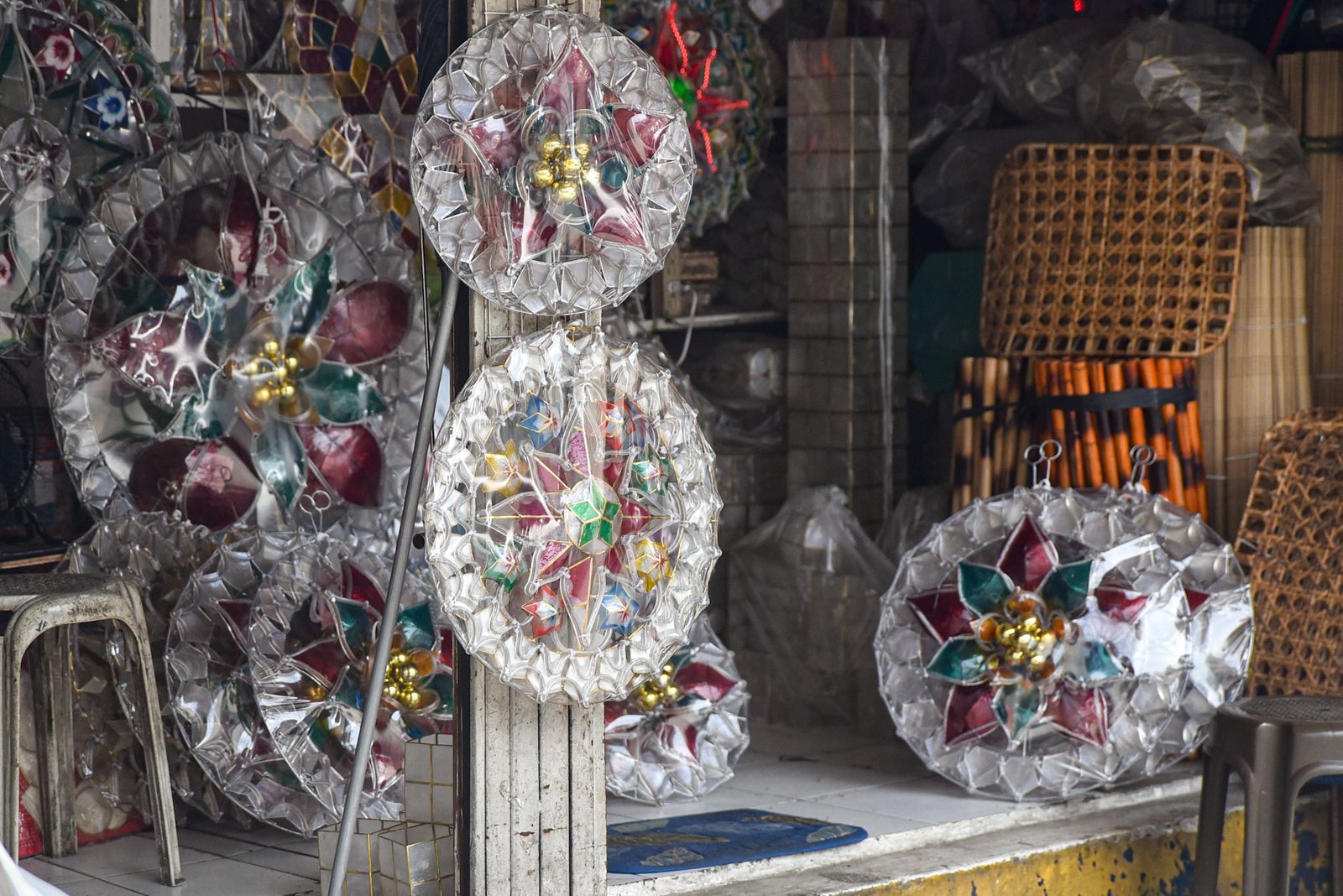 Christmas lanterns and other handicrafts are displayed in stalls under Quezon Bridge in Manila on August 31, ahead of the start of 'Ber' months. | Zedrich Xylak Madrid