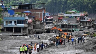 Nepal flood toll nears 1,000 as rescuers search for missing