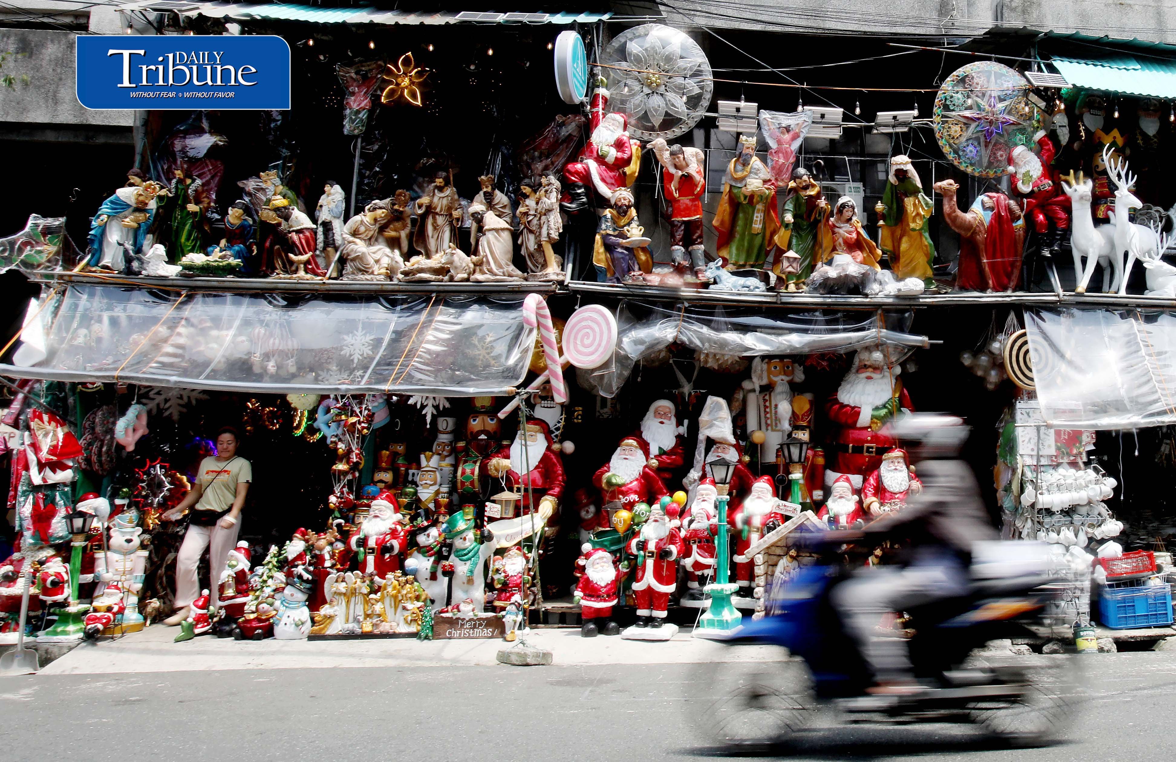 (September 01 2026) Vendors arrange their Christmas decor, while pedestrians and motorists passing on Tuesday September 1 2026, at Dapitan in Quezon City. The Philippines celebrates the world's longest Christmas season, which officially begins on September 1st and lasts until mid-January. Photo/Analy Labor