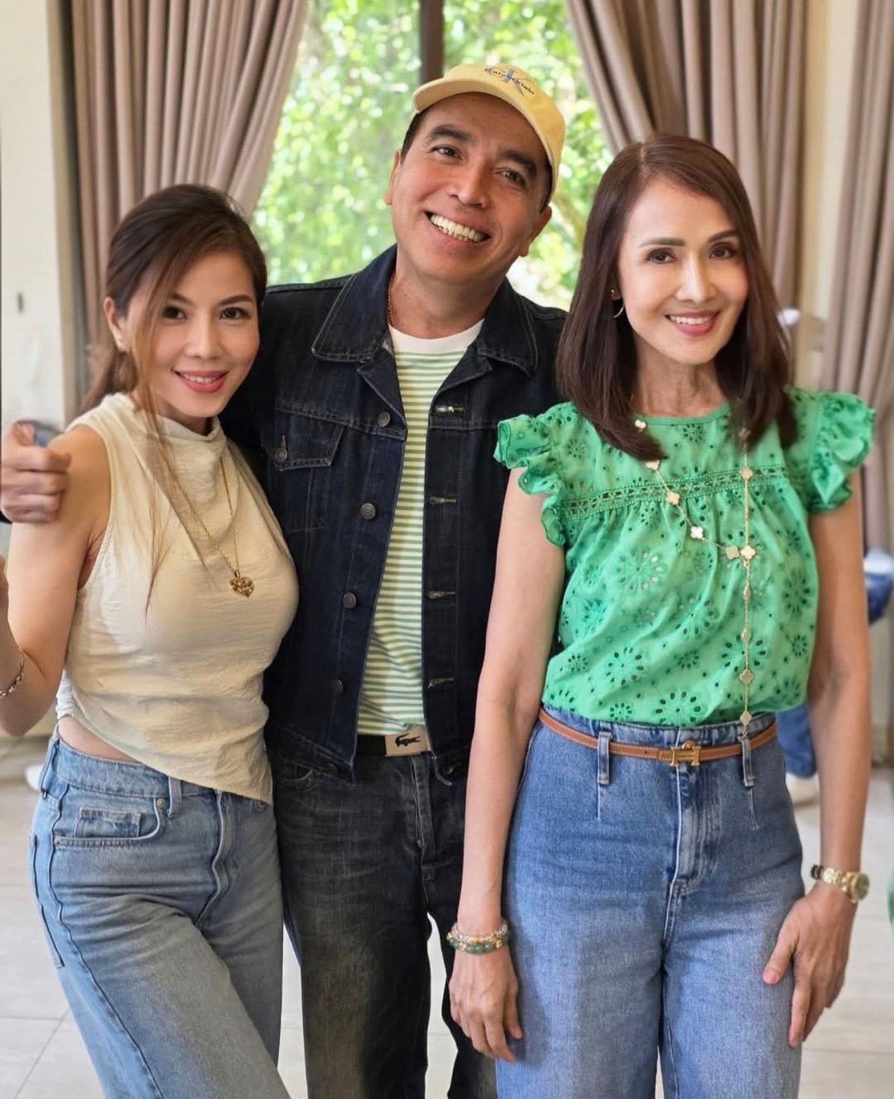 Harley Ruedas flanked by Melanie Uy Esplana and Tata Li.