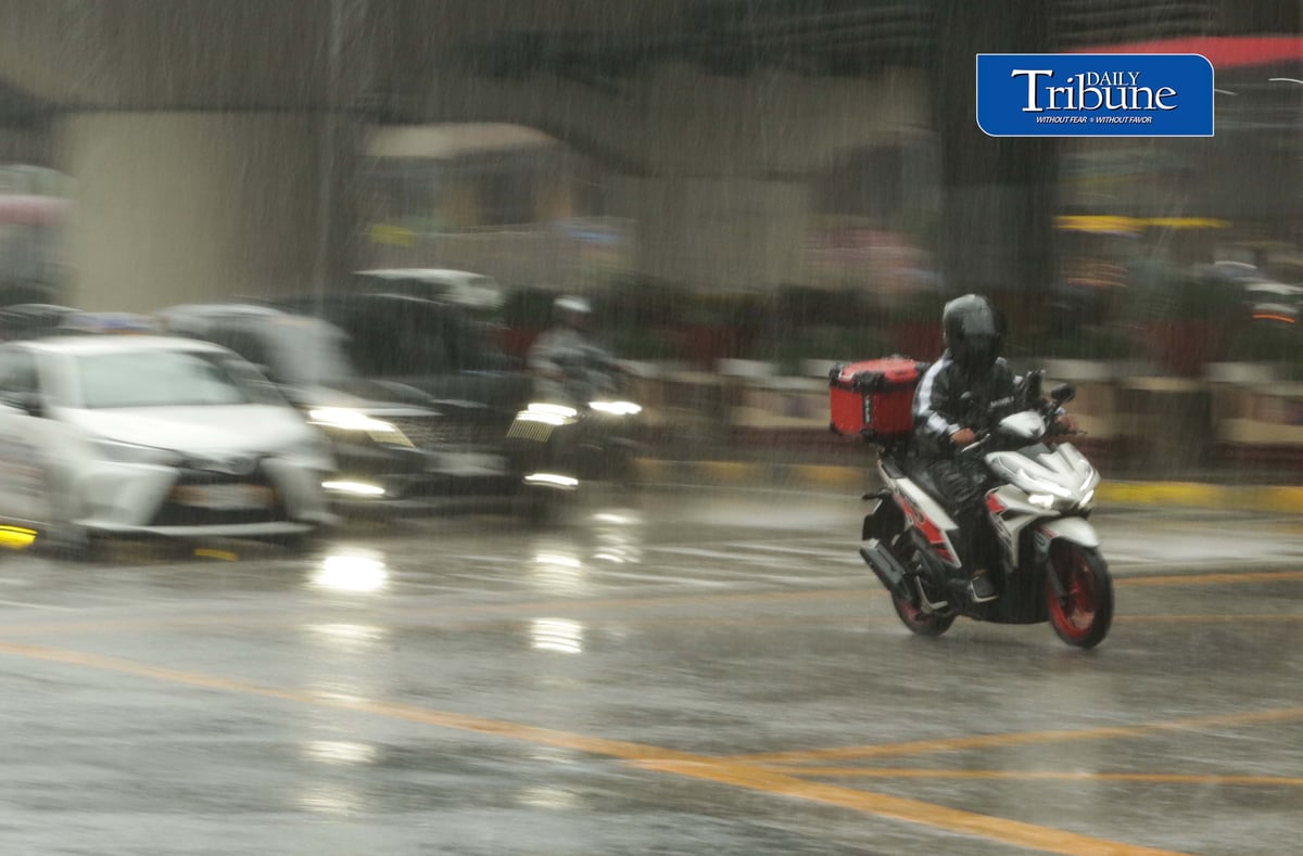 (September 03 2026) Pedestrians and motorists used protective gear while traversing EDSA in Quezon City on Thursday, September 3, 2026, due to a sudden downpour. According to the Philippine Atmospheric, Geophysical and Astronomical Services Administration (PAGASA), the southwest monsoon continues to affect parts of the country, bringing heavy rains and strong winds to Luzon, the Visayas, and some areas in Mindanao. Photo/Analy Labor