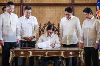 Marcos signs expanded tertiary education aid law