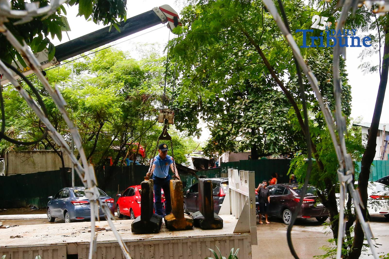 Personnel unload concrete barriers at the center island of J.W. Diokno Boulevard in front of the Philippine Senate in Pasay City on 05 September 2026. Authorities are tightening security around the Senate as the impeachment trial of Vice President Sara Duterte continues.