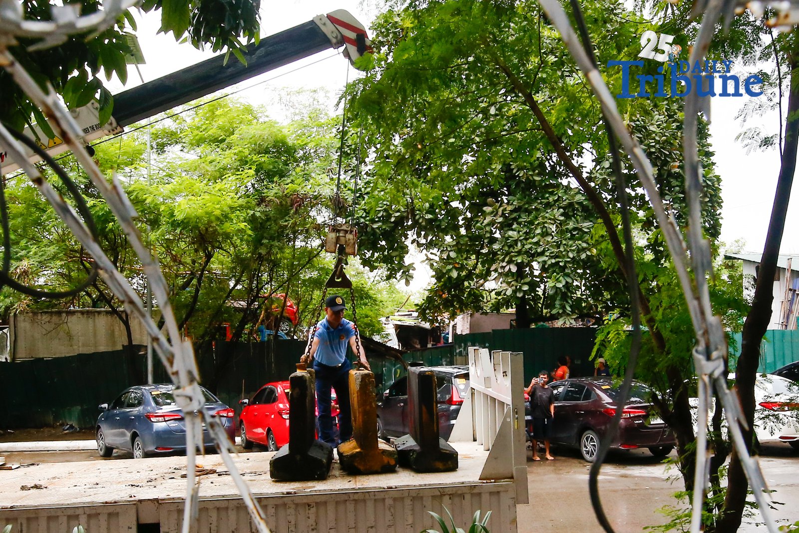 Personnel unload concrete barriers at the center island of J.W. Diokno Boulevard in front of the Philippine Senate in Pasay City on 05 September 2026. Authorities are tightening security around the Senate as the impeachment trial of Vice President Sara Duterte continues.