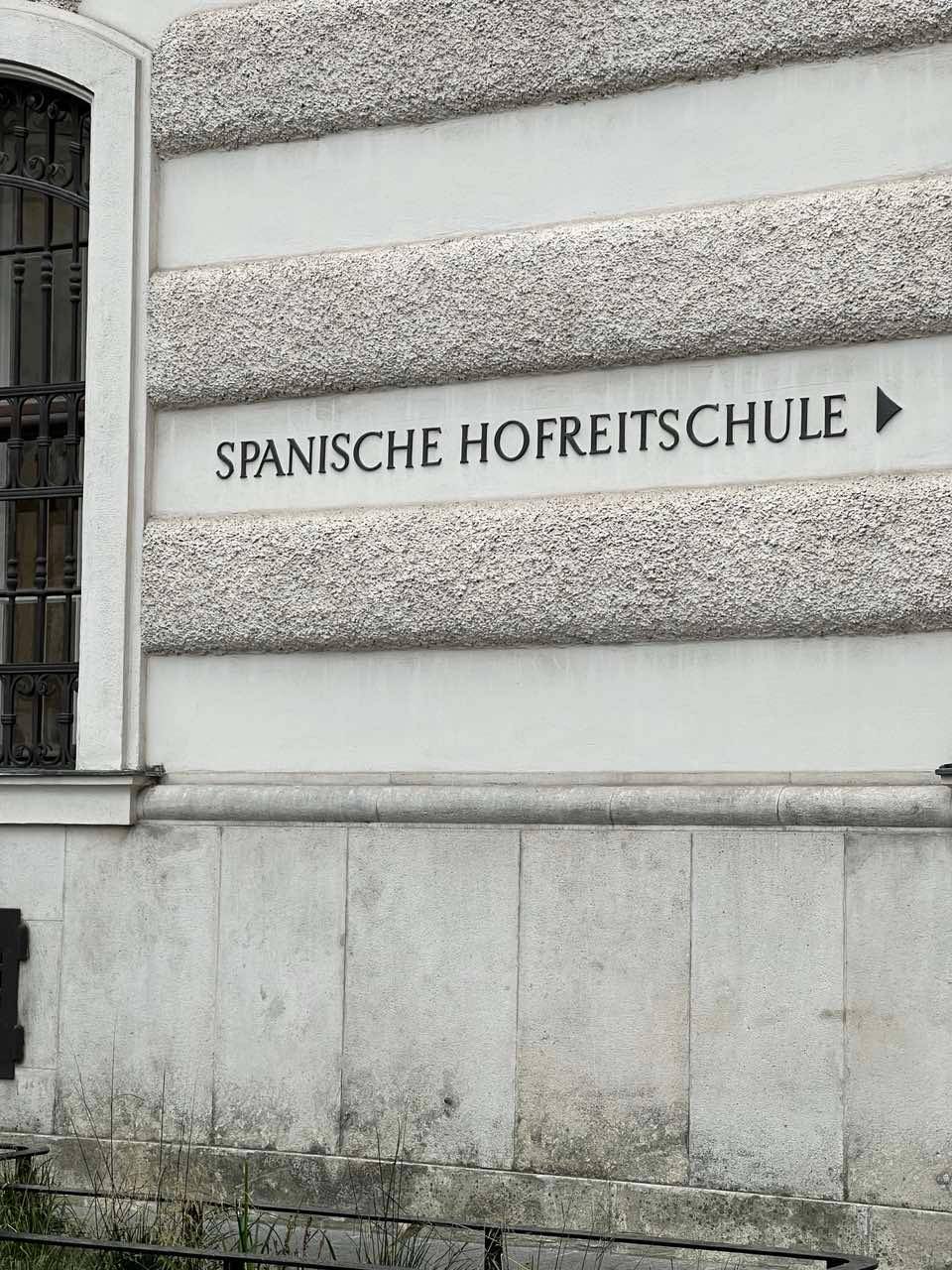 A signage leads to the school.