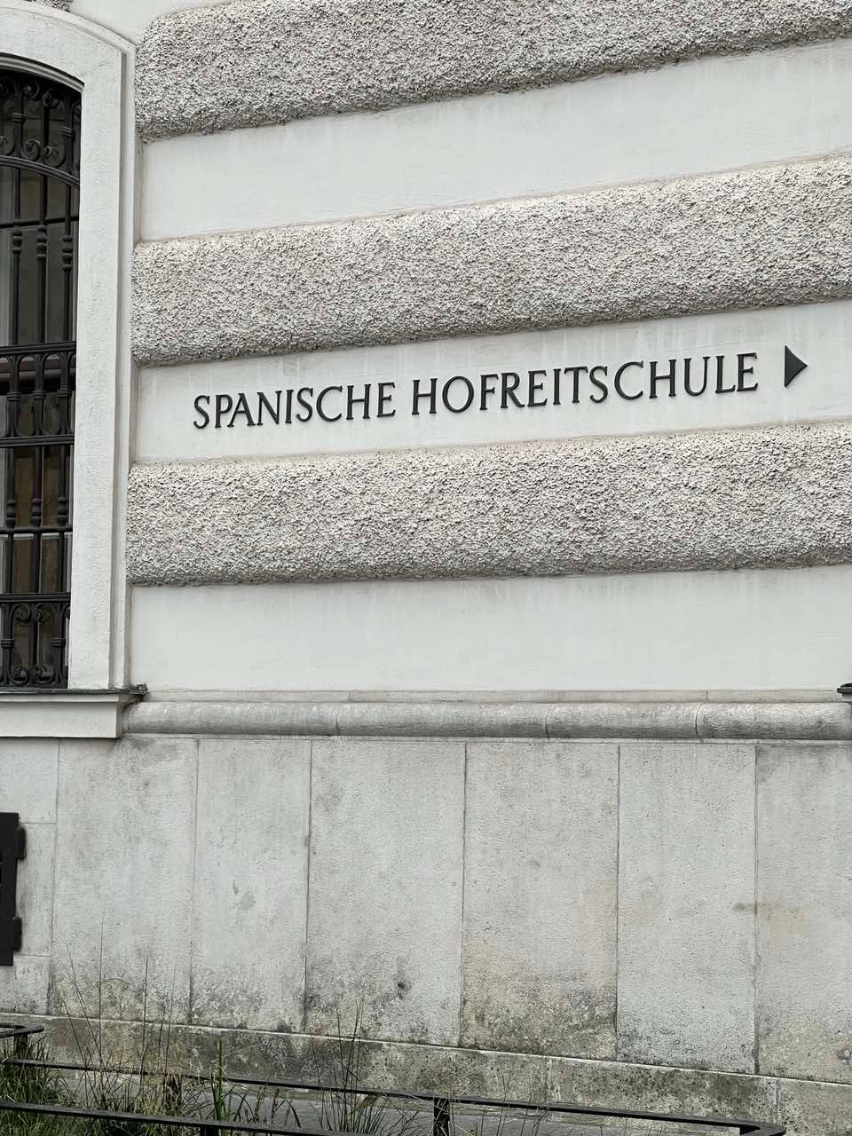 A signage leads to the school.