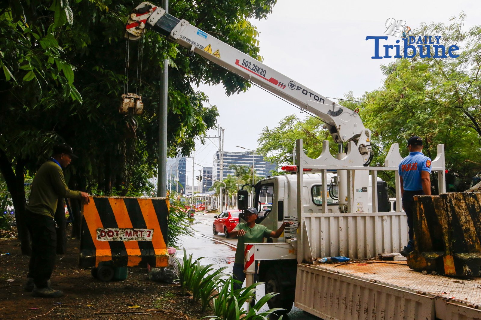 Personnel unload concrete barriers at the center island of J.W. Diokno Boulevard in front of the Philippine Senate in Pasay City on 05 September 2026. Authorities are tightening security around the Senate as the impeachment trial of Vice President Sara Duterte continues.