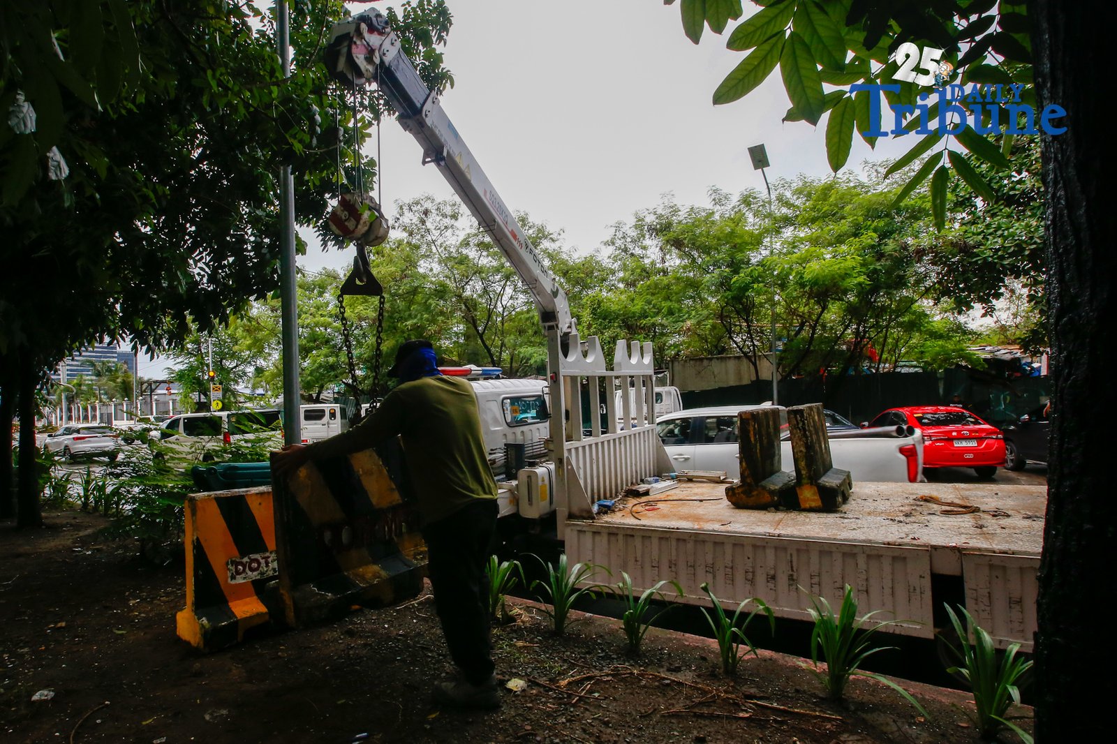 Personnel unload concrete barriers at the center island of J.W. Diokno Boulevard in front of the Philippine Senate in Pasay City on 05 September 2026. Authorities are tightening security around the Senate as the impeachment trial of Vice President Sara Duterte continues.