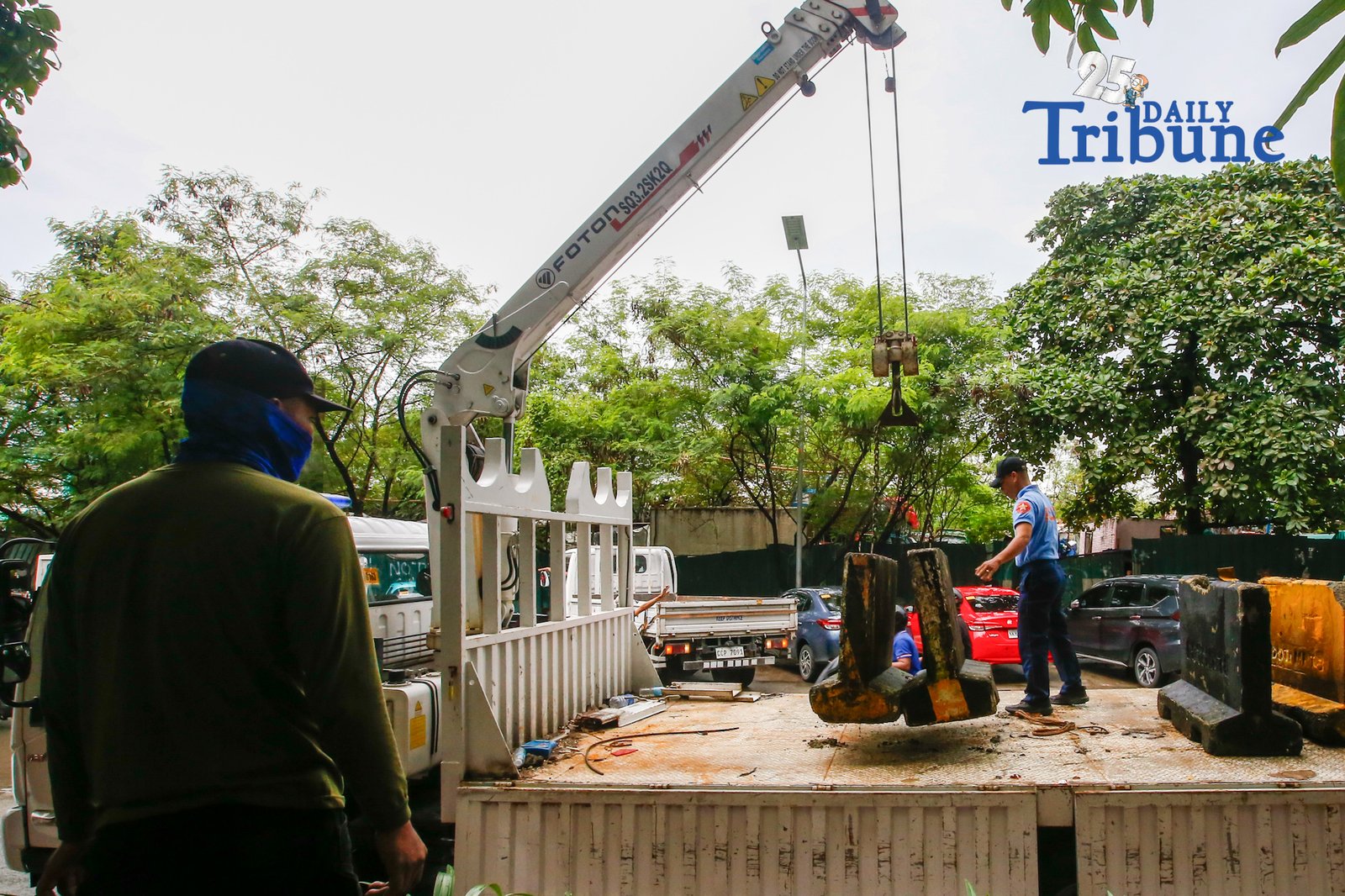 Personnel unload concrete barriers at the center island of J.W. Diokno Boulevard in front of the Philippine Senate in Pasay City on 05 September 2026. Authorities are tightening security around the Senate as the impeachment trial of Vice President Sara Duterte continues.