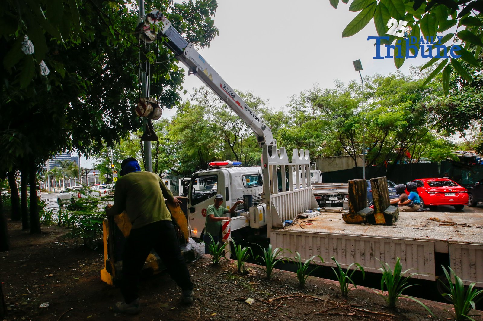 Personnel unload concrete barriers at the center island of J.W. Diokno Boulevard in front of the Philippine Senate in Pasay City on 05 September 2026. Authorities are tightening security around the Senate as the impeachment trial of Vice President Sara Duterte continues.
