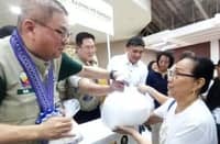 AGRICULTURE Secretary Francisco Tiu Laurel Jr. spearheaded the sale of P20 rice under the program ‘Benteng Bigas, Meron Na!’ in Lingayen, Pangasinan.