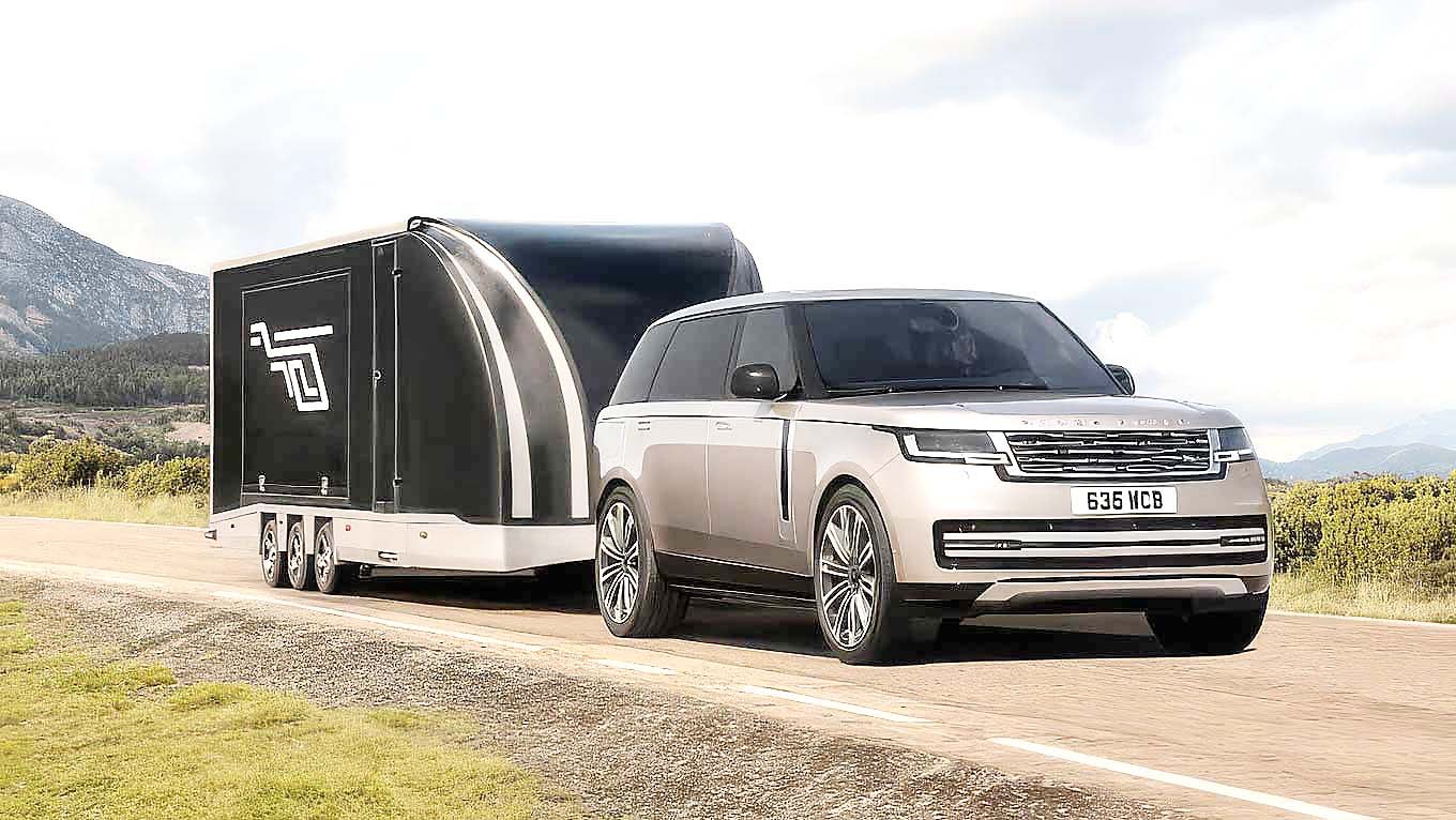 TOWING duties put the fully electric Range Rover’s utility to work on the open road.
