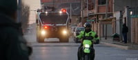 Death toll from army base blasts rises
