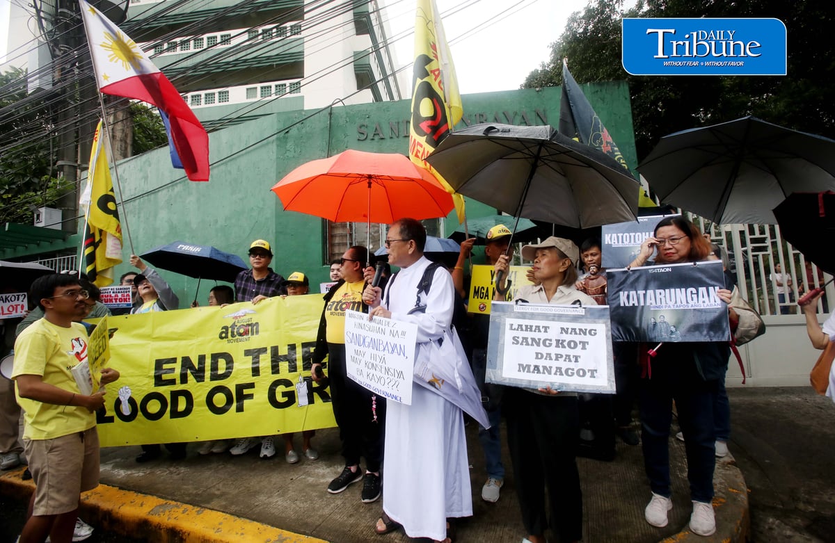PROTESTERS KEEP WATCH ON ROMUALDEZ CASE

A militant group led by Fr. Reyes stages a protest outside the Sandiganbayan in Quezon City on Monday, 7 September 2026, calling on the public to closely monitor the case filed against former House Speaker Martin Romualdez over alleged anomalies in flood control projects.

Photo by Analy Labor