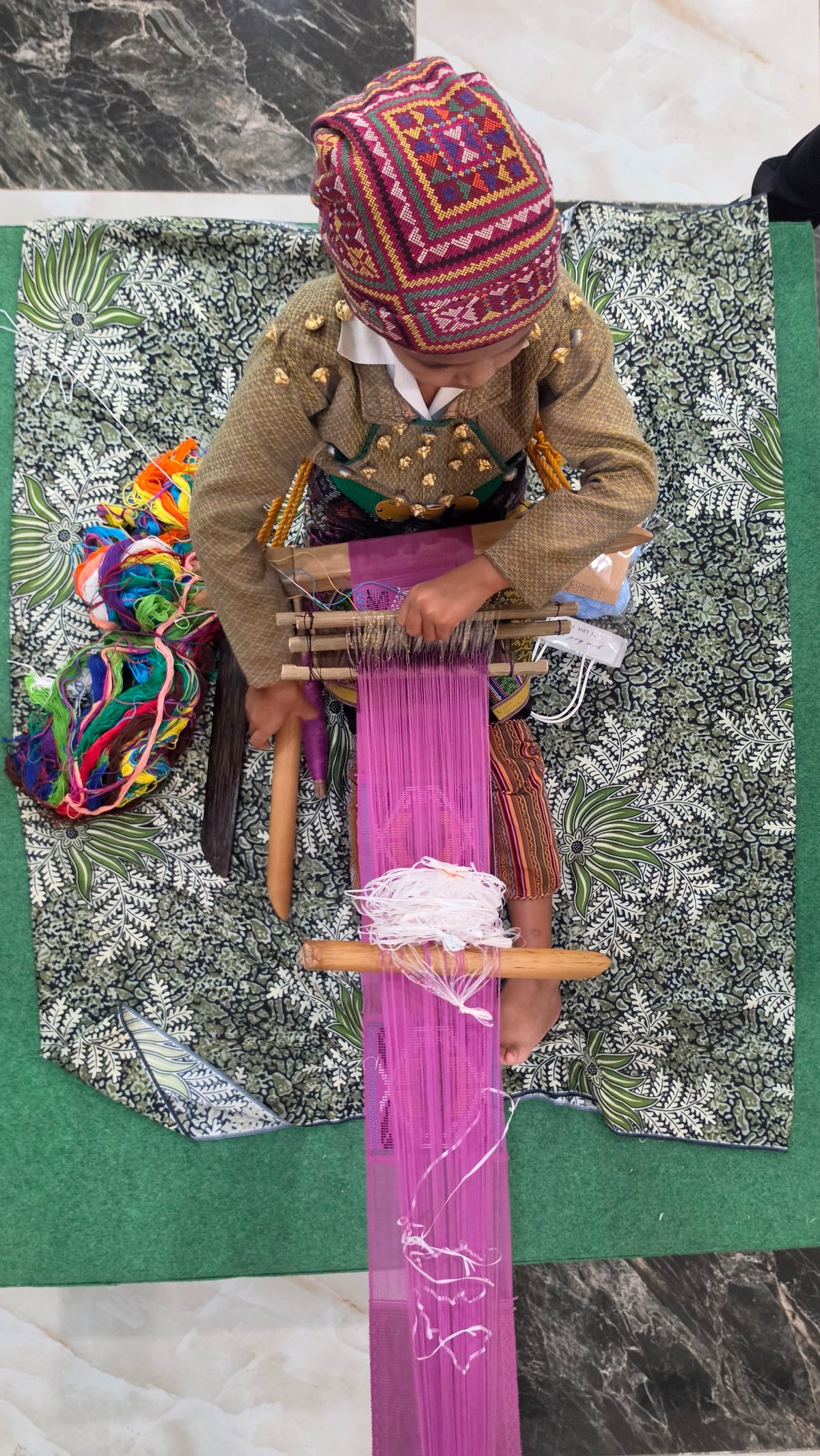 NORMINA Indasan, considered the youngest Yakan textile weaver from Basilan, shows her skill at the Regional Travel Fair.
