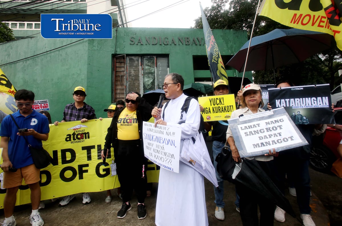 PROTESTERS KEEP WATCH ON ROMUALDEZ CASE

A militant group led by Fr. Reyes stages a protest outside the Sandiganbayan in Quezon City on Monday, 7 September 2026, calling on the public to closely monitor the case filed against former House Speaker Martin Romualdez over alleged anomalies in flood control projects.

Photo by Analy Labor