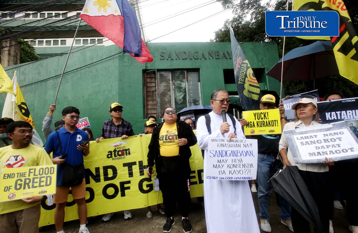 PROTESTERS KEEP WATCH ON ROMUALDEZ CASE

A militant group led by Fr. Reyes stages a protest outside the Sandiganbayan in Quezon City on Monday, 7 September 2026, calling on the public to closely monitor the case filed against former House Speaker Martin Romualdez over alleged anomalies in flood control projects.

Photo by Analy Labor