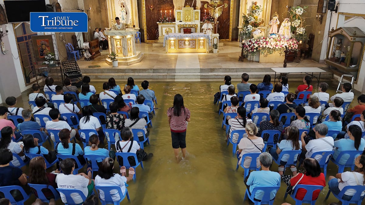 FAITH ABOVE THE FLOODWATERS

Floodwaters fail to deter devotees from attending Mass at St. John the Baptist Parish Church in Barangay San Juan, Hagonoy, Bulacan, on Tuesday, 8 September 2026, to celebrate the Nativity of the Blessed Virgin Mary.

The village has remained flooded for about a month due to persistent monsoon rains.

Photo by Analy Labor