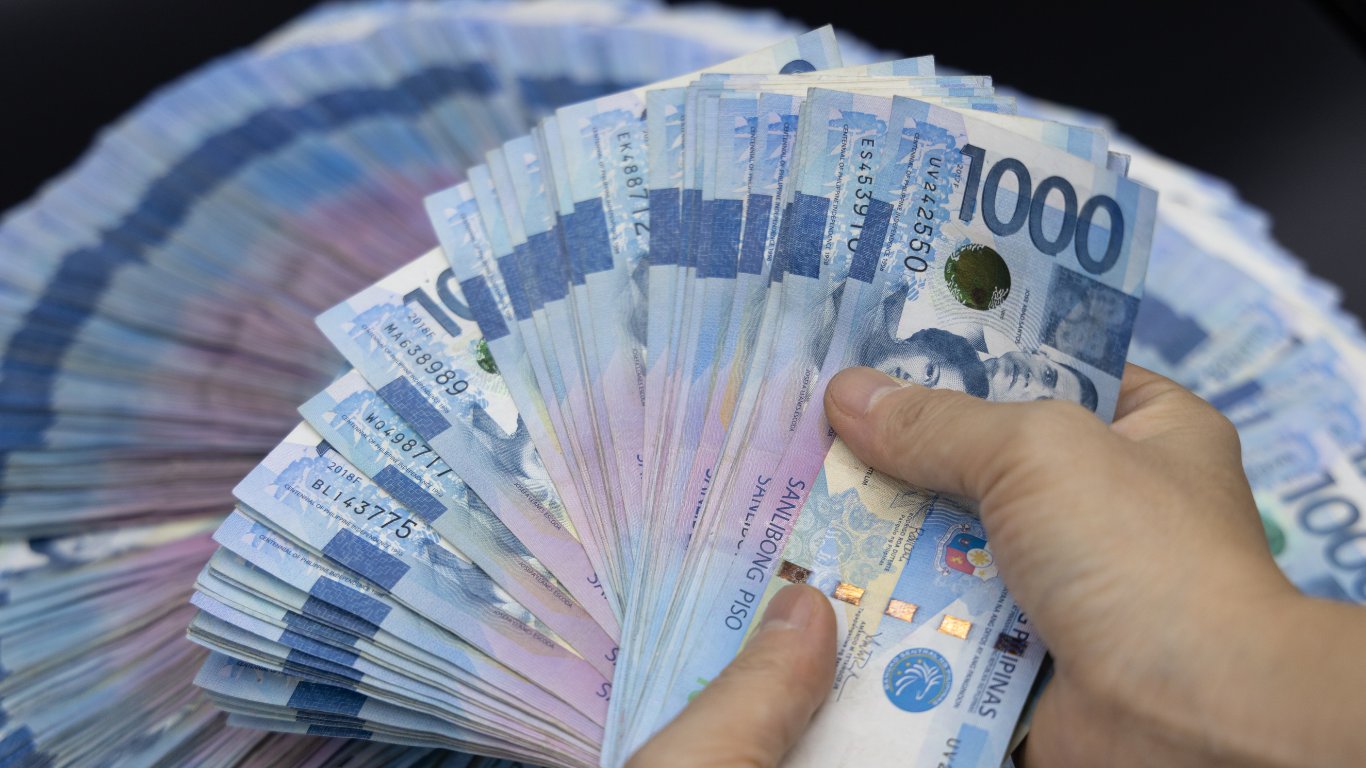 Peso hits record low