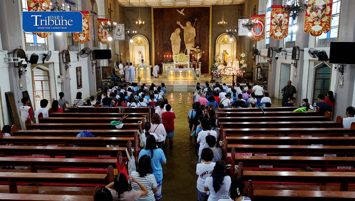 FAITH ABOVE THE FLOODWATERS

Floodwaters fail to deter devotees from attending Mass at St. John the Baptist Parish Church in Barangay San Juan, Hagonoy, Bulacan, on Tuesday, 8 September 2026, to celebrate the Nativity of the Blessed Virgin Mary.

The village has remained flooded for about a month due to persistent monsoon rains.

Photo by Analy Labor