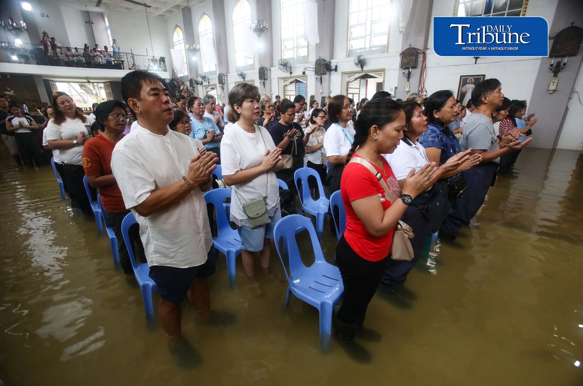 FAITH ABOVE THE FLOODWATERS

Floodwaters fail to deter devotees from attending Mass at St. John the Baptist Parish Church in Barangay San Juan, Hagonoy, Bulacan, on Tuesday, 8 September 2026, to celebrate the Nativity of the Blessed Virgin Mary.

The village has remained flooded for about a month due to persistent monsoon rains.

Photo by Analy Labor