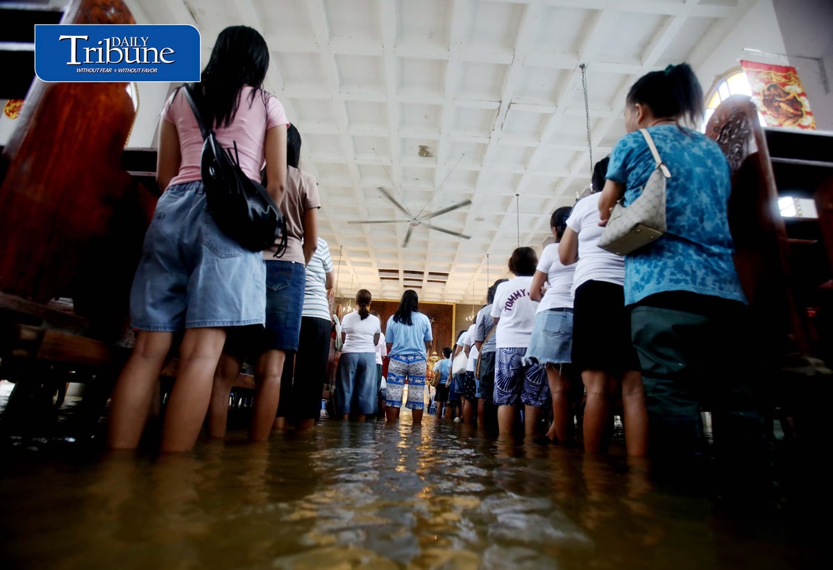 FAITH ABOVE THE FLOODWATERS

Floodwaters fail to deter devotees from attending Mass at St. John the Baptist Parish Church in Barangay San Juan, Hagonoy, Bulacan, on Tuesday, 8 September 2026, to celebrate the Nativity of the Blessed Virgin Mary.

The village has remained flooded for about a month due to persistent monsoon rains.

Photo by Analy Labor