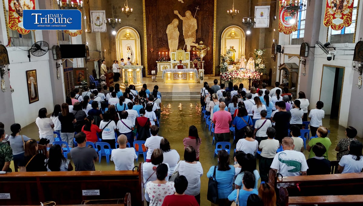 FAITH ABOVE THE FLOODWATERS

Floodwaters fail to deter devotees from attending Mass at St. John the Baptist Parish Church in Barangay San Juan, Hagonoy, Bulacan, on Tuesday, 8 September 2026, to celebrate the Nativity of the Blessed Virgin Mary.

The village has remained flooded for about a month due to persistent monsoon rains.

Photo by Analy Labor