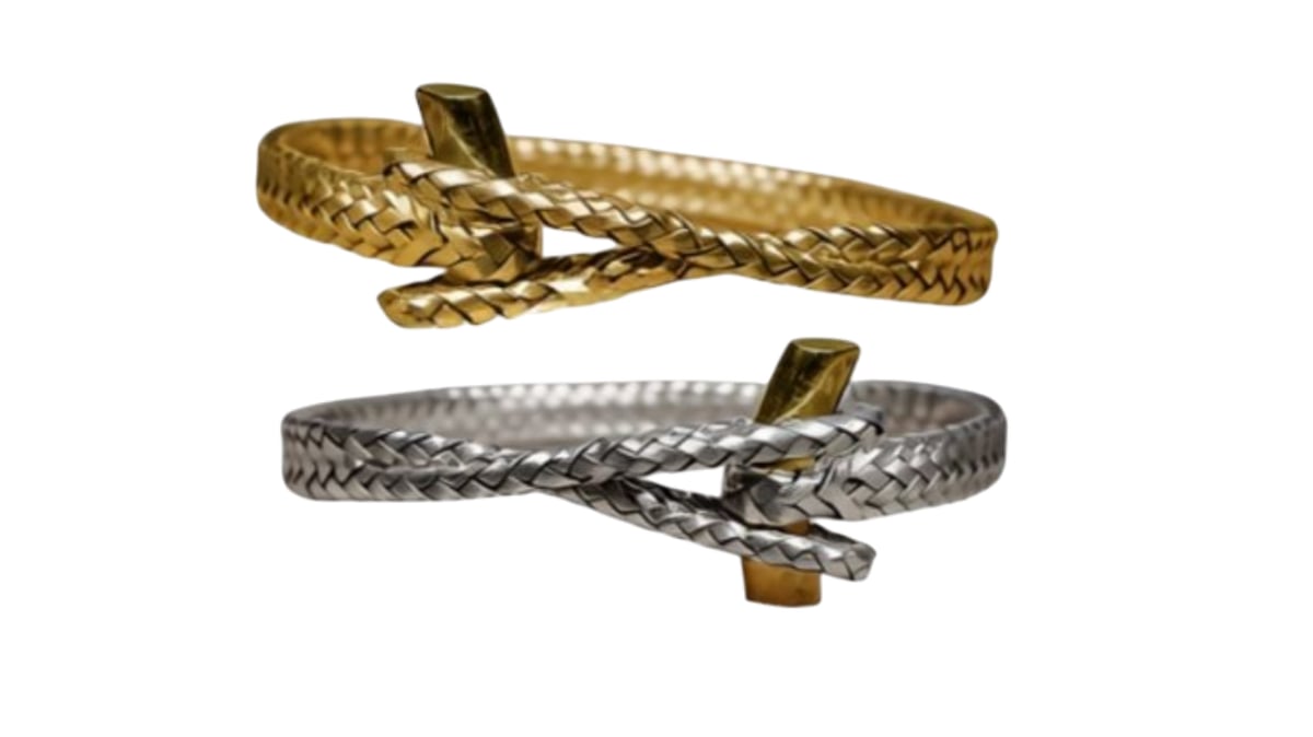 BRACELETS in gold and leather by Caro Wilson.