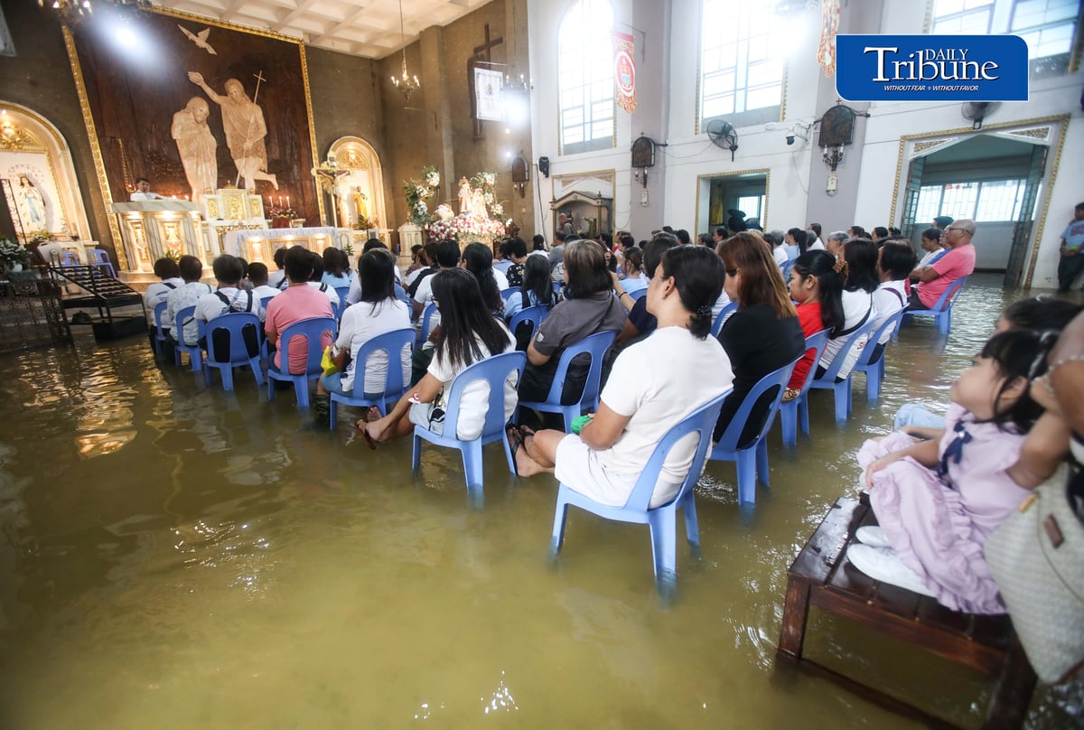 FAITH ABOVE THE FLOODWATERS

Floodwaters fail to deter devotees from attending Mass at St. John the Baptist Parish Church in Barangay San Juan, Hagonoy, Bulacan, on Tuesday, 8 September 2026, to celebrate the Nativity of the Blessed Virgin Mary.

The village has remained flooded for about a month due to persistent monsoon rains.

Photo by Analy Labor