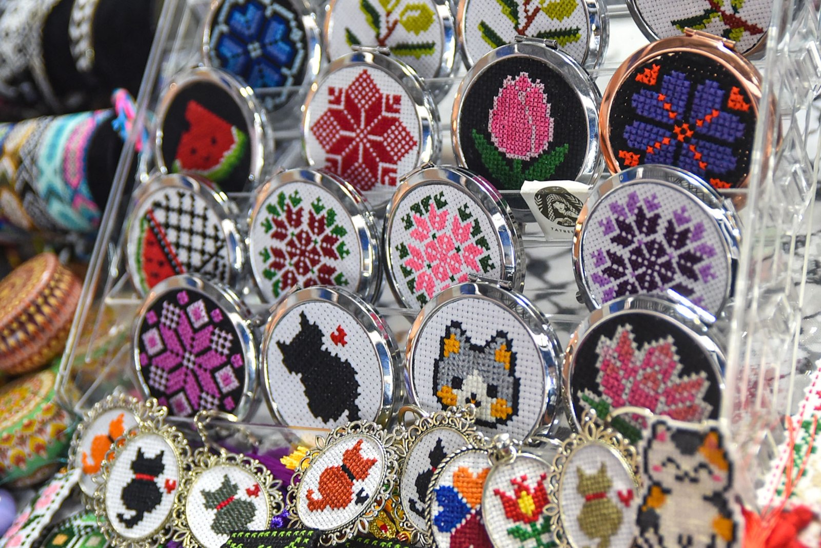 Handcraft bookmarks, accessories and Tatriz items along with homemade sweets are on display at the Gaza Candle and Tatriz Asia booths at Greenhills Shopping Centre in San Juan City, on September 8. l Zedrich Xylak Madrid