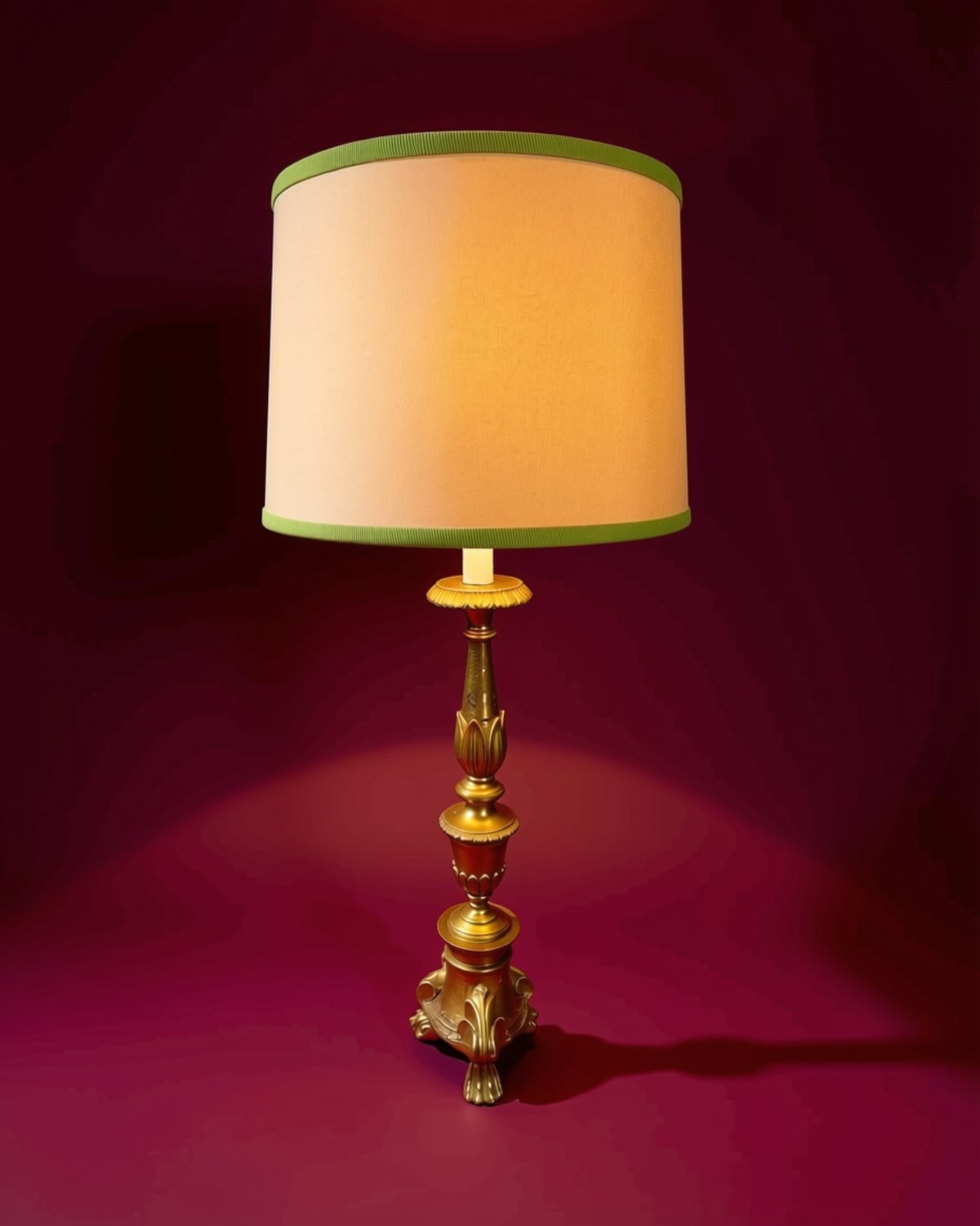 18TH century tuscan ecclesiastical candlesticks electrified to lamps with silk shades and grosgrain trims.