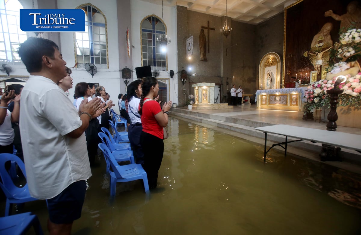 FAITH ABOVE THE FLOODWATERS

Floodwaters fail to deter devotees from attending Mass at St. John the Baptist Parish Church in Barangay San Juan, Hagonoy, Bulacan, on Tuesday, 8 September 2026, to celebrate the Nativity of the Blessed Virgin Mary.

The village has remained flooded for about a month due to persistent monsoon rains.

Photo by Analy Labor