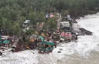 WATER's edge Strong seawater reaches properties in Barangay Liwliwa, Zambales, on 3 September, as coastal erosion continues to eat away at the shoreline, affecting infrastructure and businesses along the coast. Residents have blamed nearby sand-dredging operations for the worsening erosion.