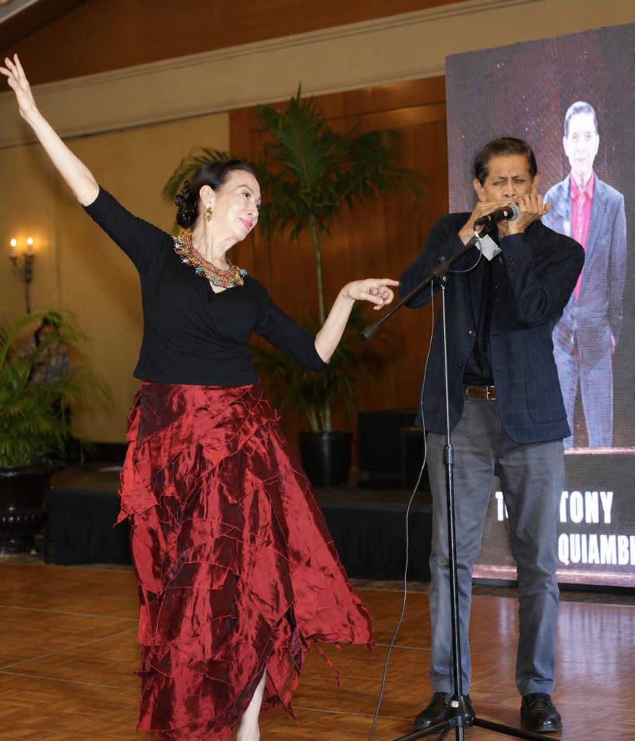 LORNA Quisumbing does the rumba and husband Tony Quisumbing plays the harmonica.