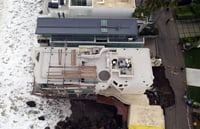 Waves open sinkhole at actor Nicolas Cage’s house