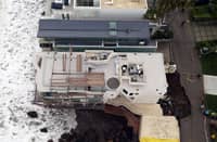 A SINKHOLE on a street and driveway of a seaside home affected by large swells produced by ‘Hurricane Marie’ in Malibu, California, on 8 September 2026.