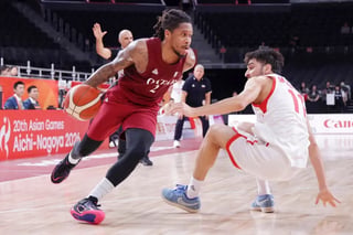 Qatar rips Iran in Nagoya opener