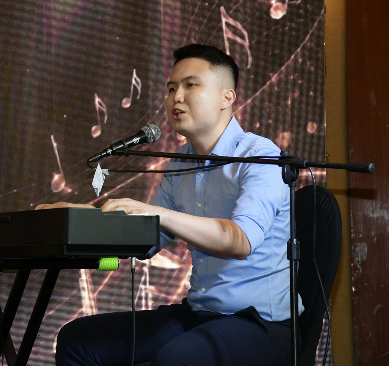 OSCAR Tan III on the keyboard.
