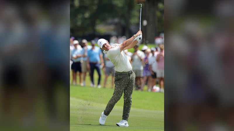 McIlroy trails Niemann