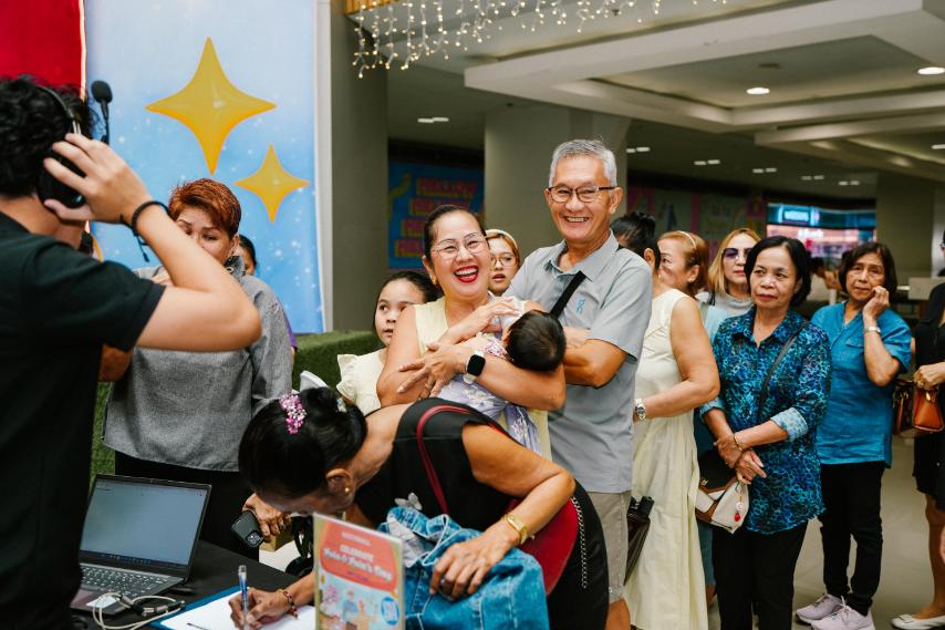 SENIOR citizens and their families are all smiles as they enjoy treats from SM Supermalls’ events.