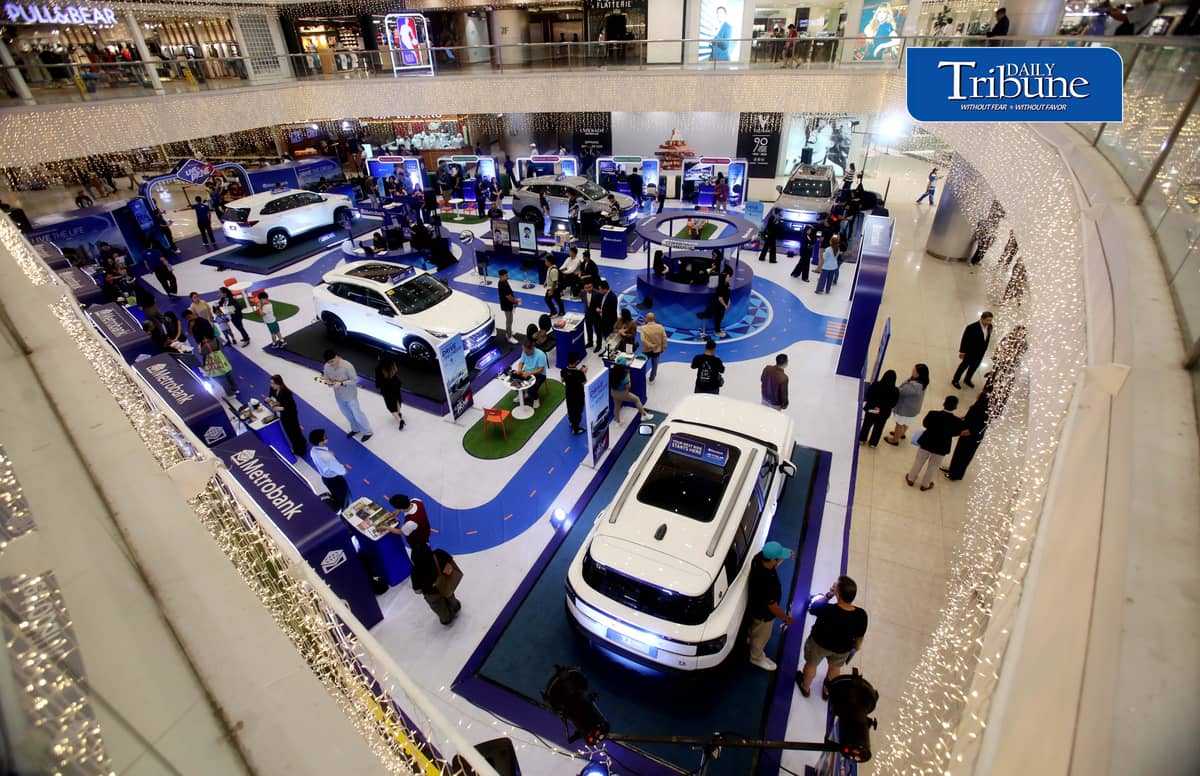 Car enthusiasts visit the two-day Metrobank Live and Drive Home and Car Loan event at SM Megamall on Saturday, 12 September. The event, which runs until Sunday, features hybrid vehicles, residential developments and solar solutions. | Analy Labor