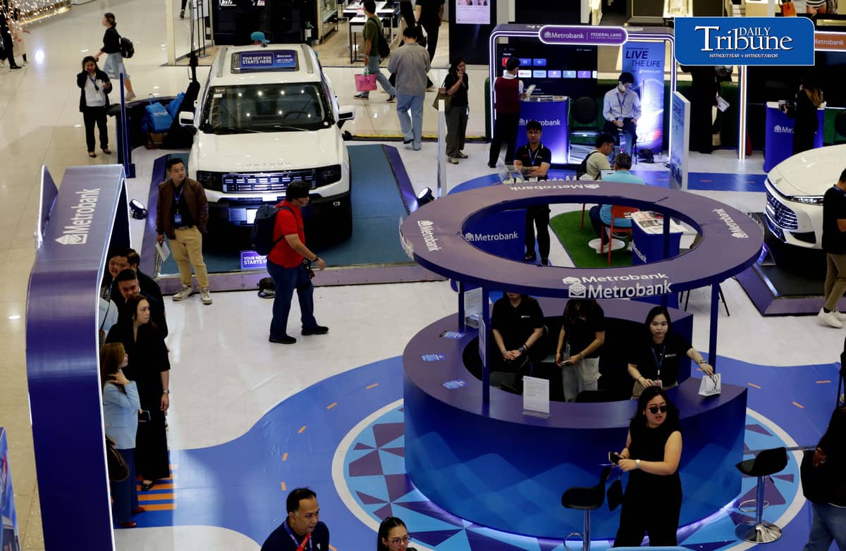 Car enthusiasts visit the two-day Metrobank Live and Drive Home and Car Loan event at SM Megamall on Saturday, 12 September. The event, which runs until Sunday, features hybrid vehicles, residential developments and solar solutions. | Analy Labor