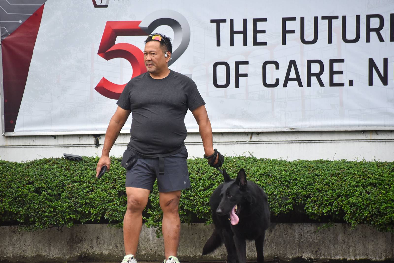 Senator JV. Ejercito is seen walking his dog outside the Cardinal Santos Medical Center in San Juan City, on September 12. l Zedrich Xylak Madrid