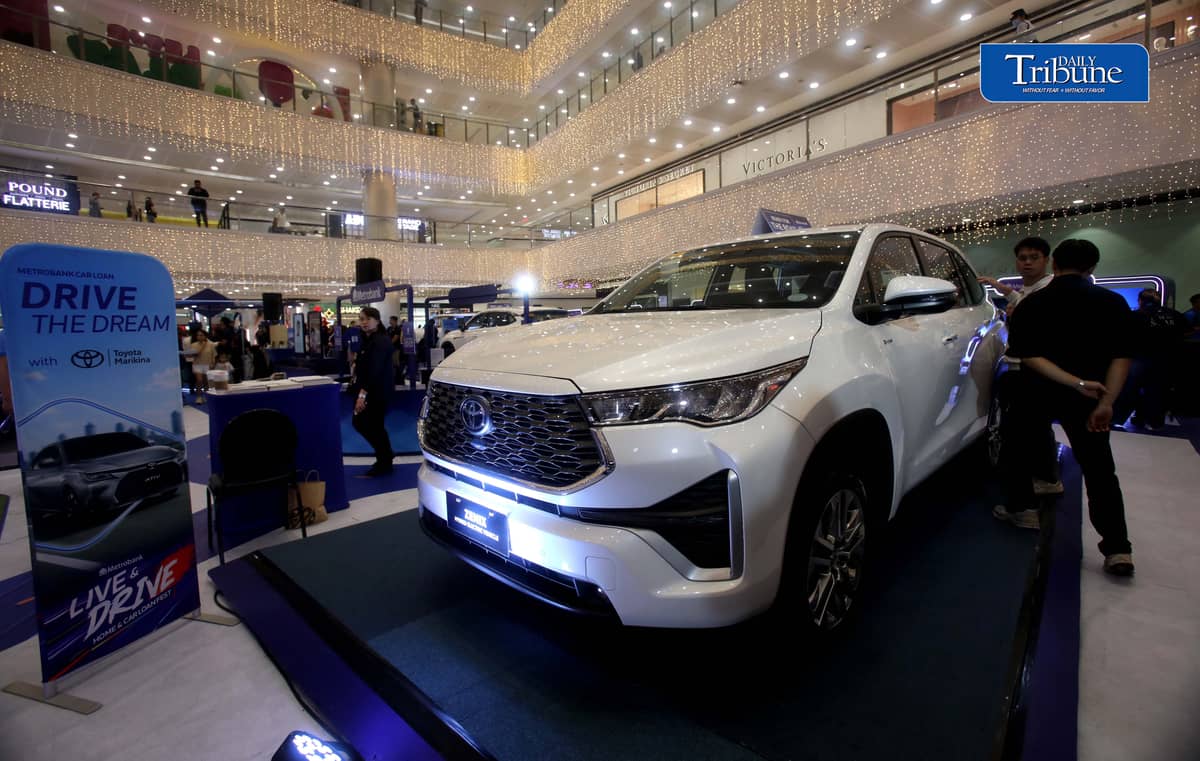 Car enthusiasts visit the two-day Metrobank Live and Drive Home and Car Loan event at SM Megamall on Saturday, 12 September. The event, which runs until Sunday, features hybrid vehicles, residential developments and solar solutions. | Analy Labor