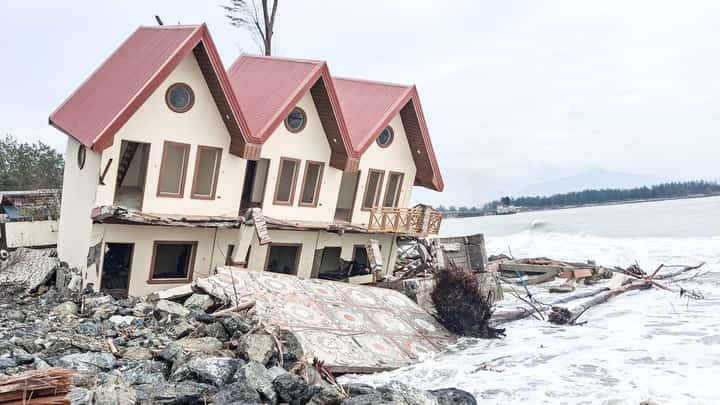 GROUND ZERO: A two-storey resort establishment with six rooms in Sitio Liwliwa, Barangay Sto. Niño, San Felipe, Zambales, is now leaning and could collapse at any time after strong waves caused severe erosion and washed away the sand supporting its foundation. Armor rocks were placed along the shoreline as a barrier to protect the remaining portion of nearby resort, which has also sustained damage.