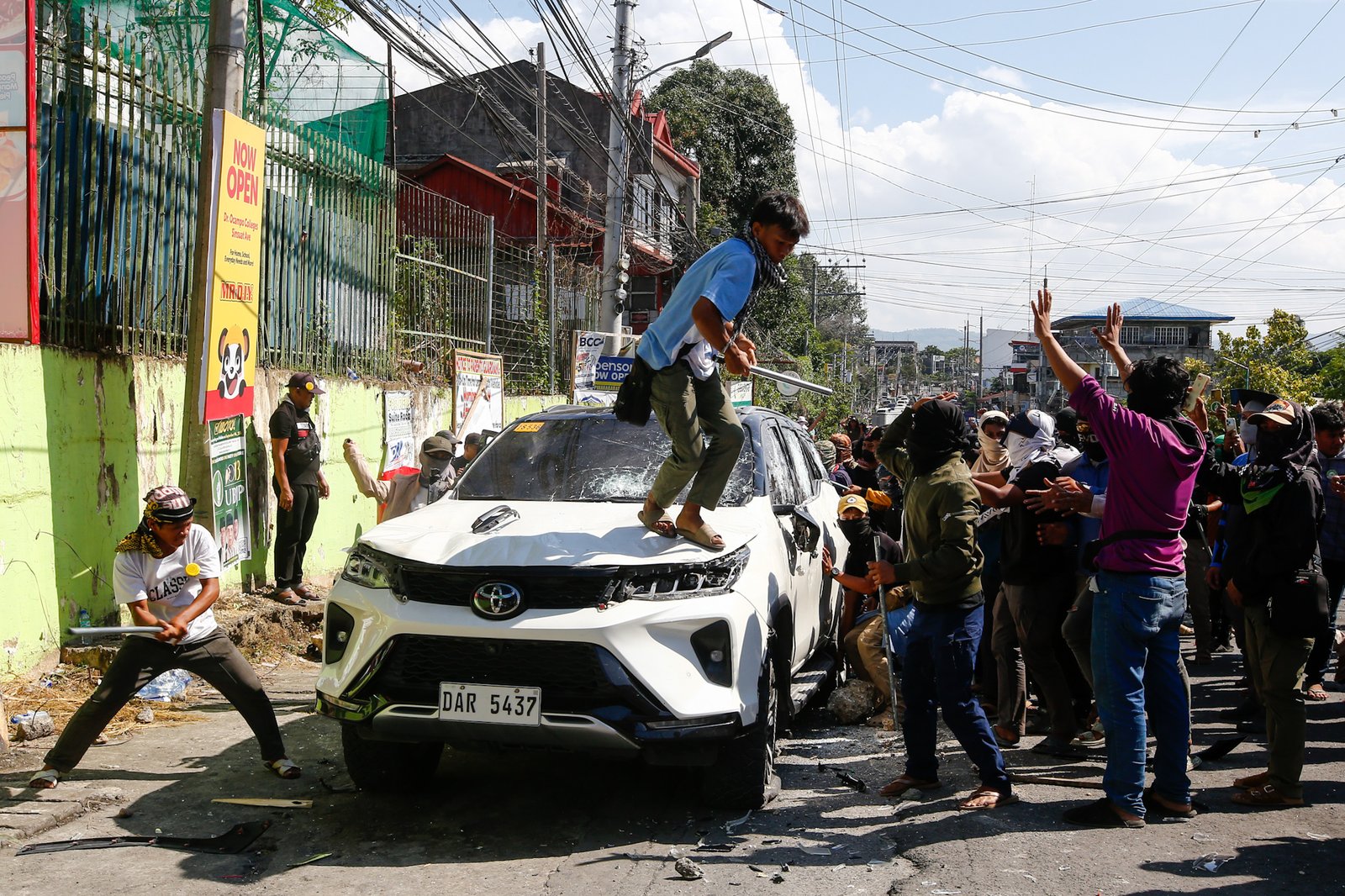 A riot erupts outside Sero Central School along Sinsuat Avenue in Cotabato City on 14 September 2026 as voting continues in the first Bangsamoro Parliamentary Elections. The perpetrators claimed to be members of the United Bangsamoro Justice Party (UBJP). The Commission on Elections has placed Cotabato City under its control following election-related violence.