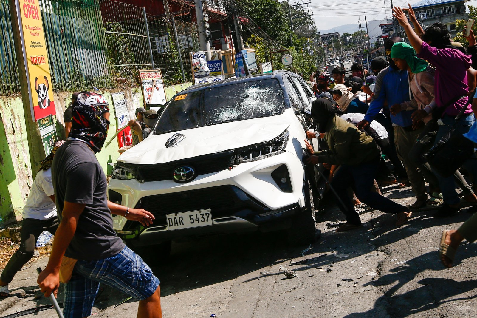 A riot erupts outside Sero Central School along Sinsuat Avenue in Cotabato City on 14 September 2026 as voting continues in the first Bangsamoro Parliamentary Elections. The perpetrators claimed to be members of the United Bangsamoro Justice Party (UBJP). The Commission on Elections has placed Cotabato City under its control following election-related violence.