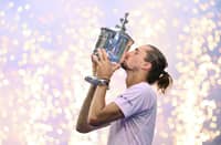 Germany's Alexander Zverev kisses the trophy after defeating USA's Ben Shelton in the men's singles final tennis match on day fifteen of the US Open tennis tournament at the USTA Billie Jean King National Tennis Center in New York on September 13, 2026.