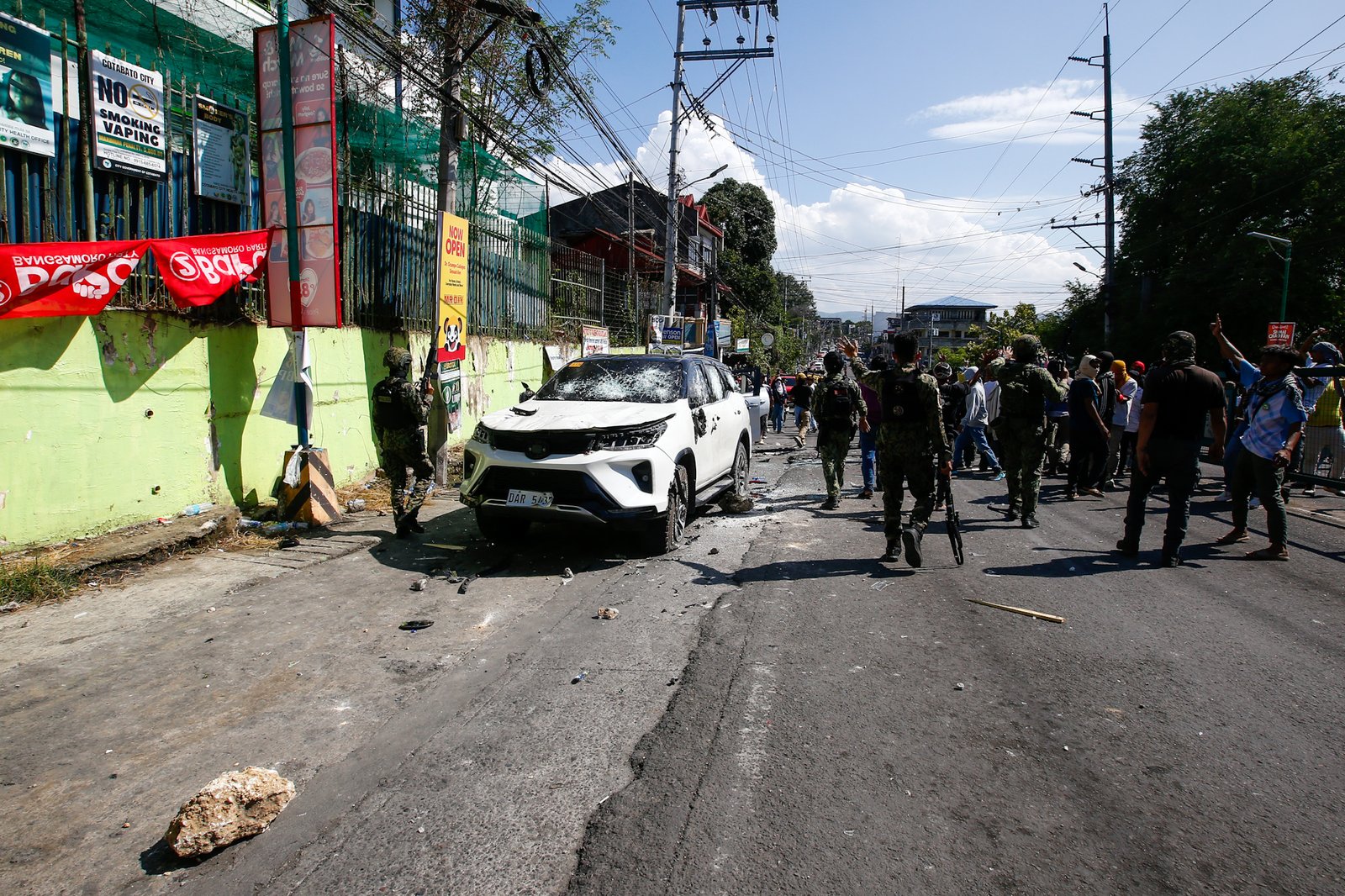 A riot erupts outside Sero Central School along Sinsuat Avenue in Cotabato City on 14 September 2026 as voting continues in the first Bangsamoro Parliamentary Elections. The perpetrators claimed to be members of the United Bangsamoro Justice Party (UBJP). The Commission on Elections has placed Cotabato City under its control following election-related violence.