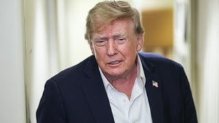 Trump downplays China, Iran intelligence report